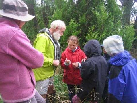 Students learn from Hugh Wilson the Legend at Hinewai Reserve